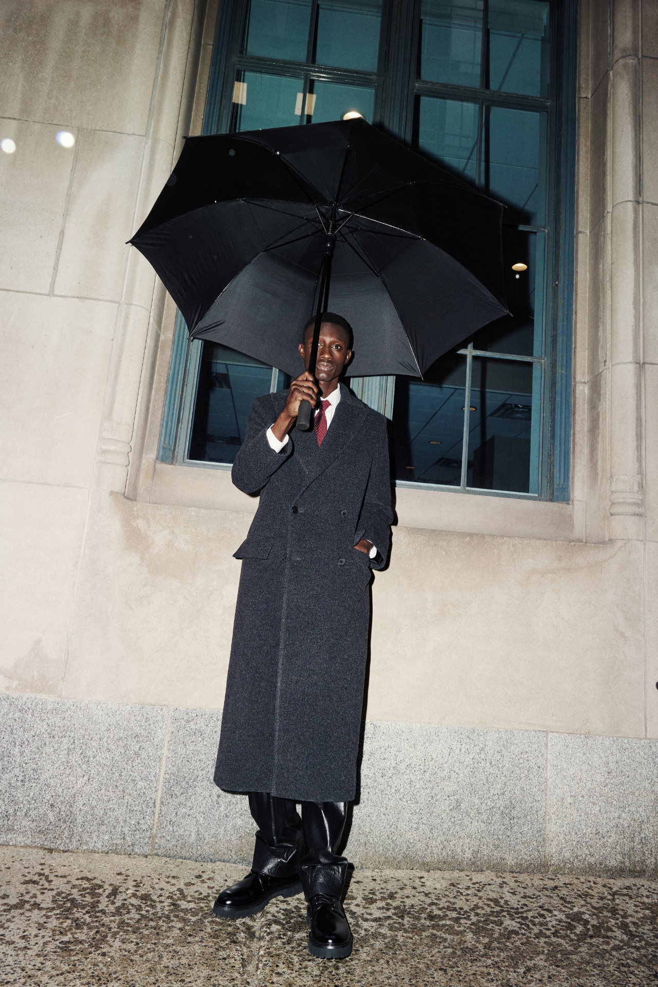 Step out in style with this Italian wool blend coat. This double-breasted outerwear piece is semi-fitted through the shoulders and arms, offering a relaxed fit through the torso. The spread collar and back belt detail add sophisticated touches to this jacket. Complete with a back vent and practical flap pockets, this wool coat is a timeless addition to your wardrobe.
