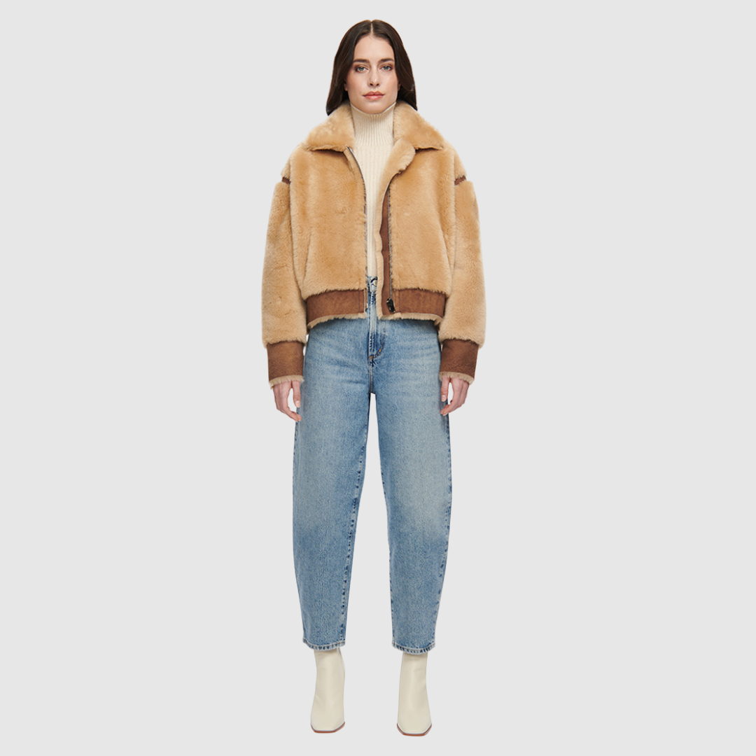 Reversible oversize cropped jacket Ironed wool and nappa combination Drop shoulder Tapered at hem Standard front zip closure Side and interior zip pockets