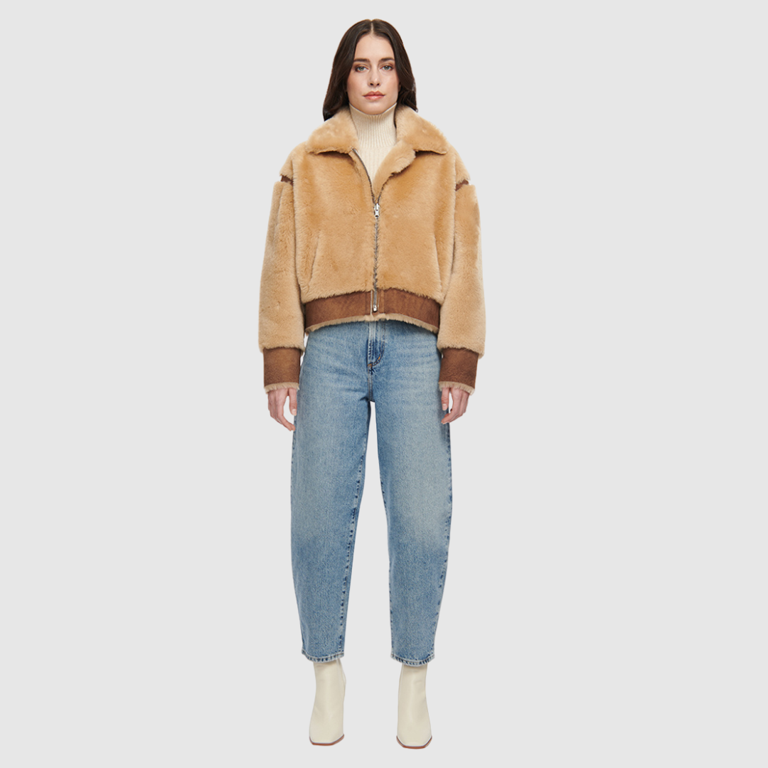 Reversible oversize cropped jacket Ironed wool and nappa combination Drop shoulder Tapered at hem Standard front zip closure Side and interior zip pockets