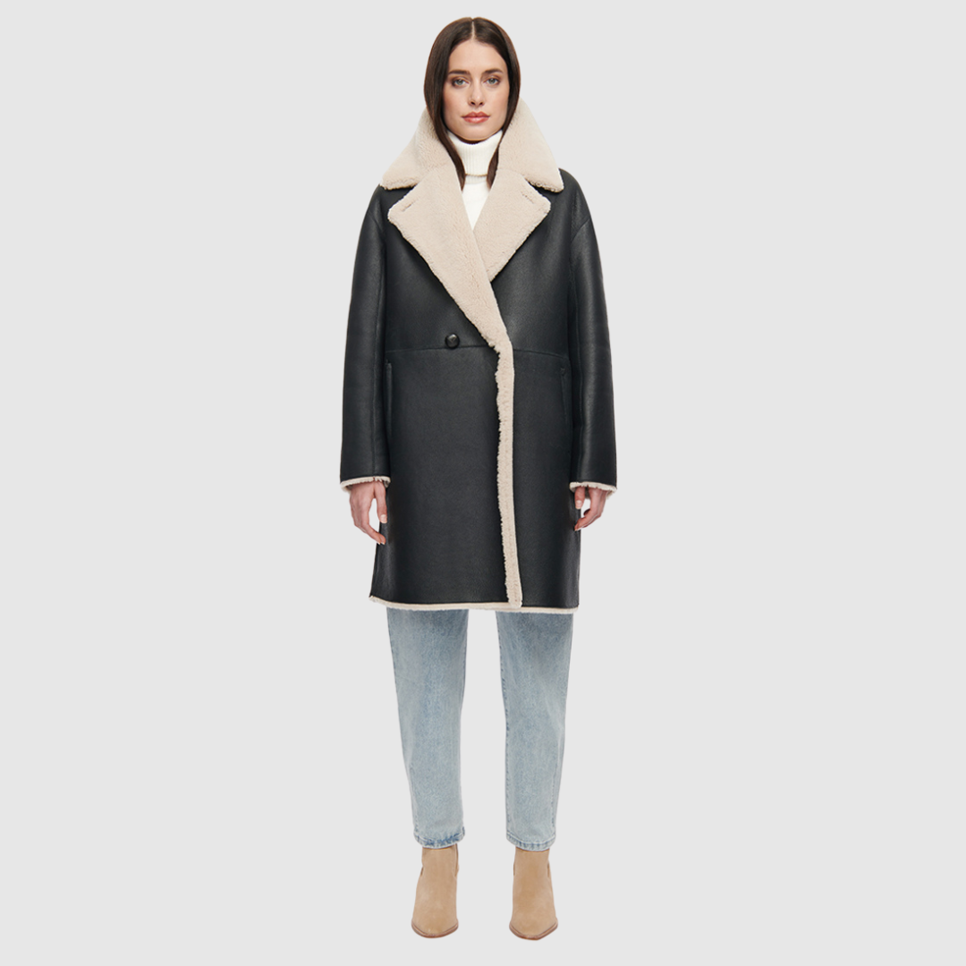 80s inspired reversible notch collar nappa coat Oversized loose fitted style Reverses to curly wool teddy Relaxed dropped shoulder Button closure Slash pockets