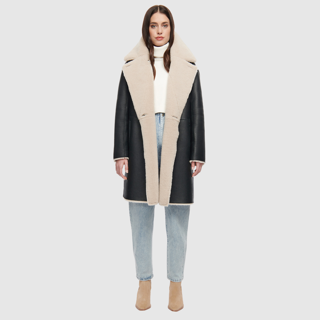 80s inspired reversible notch collar nappa coat Oversized loose fitted style Reverses to curly wool teddy Relaxed dropped shoulder Button closure Slash pockets