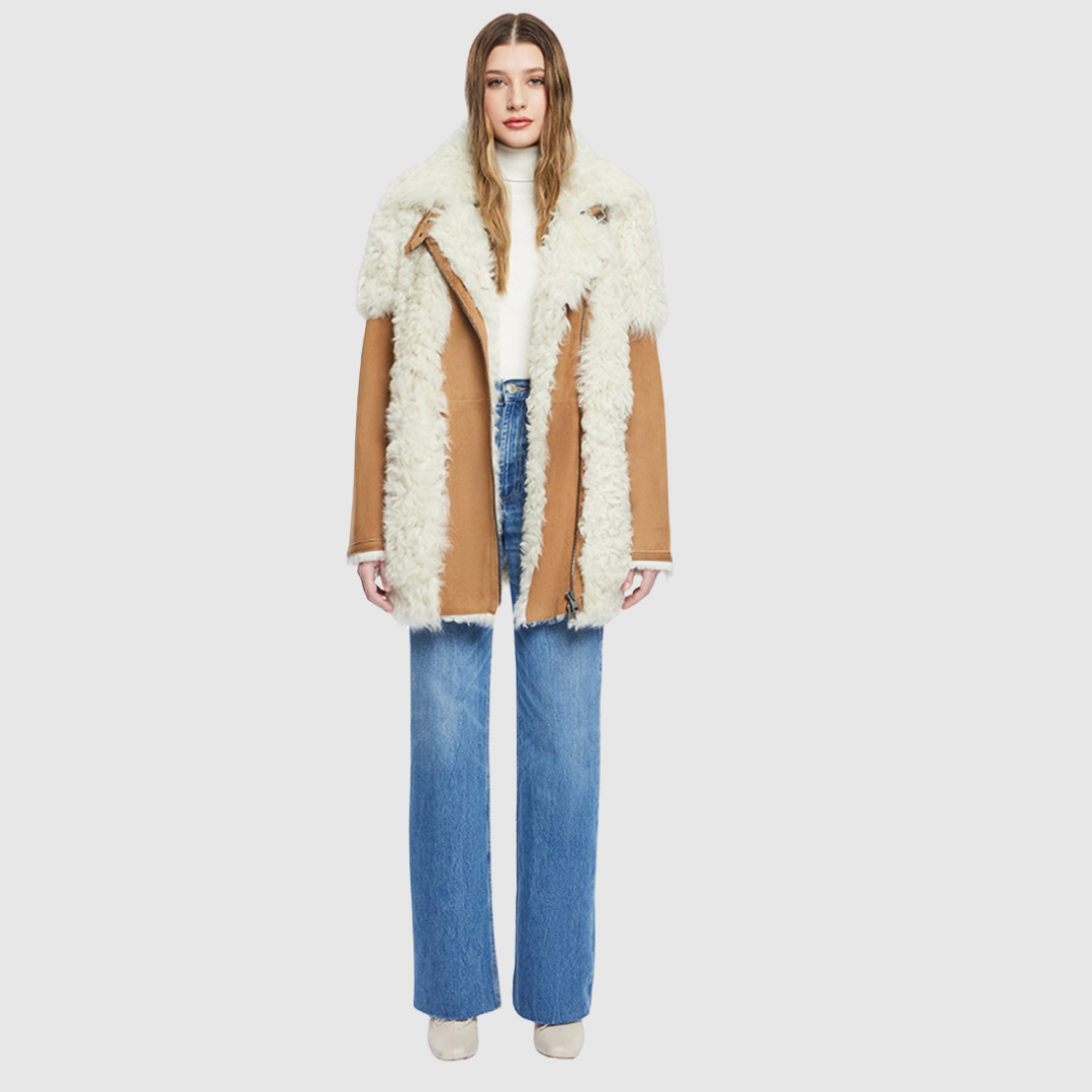 Mixed media suede moto Contrast toscana wool detailing on shoulders and body Large curly toscana notch collar Relaxed fit through shoulder and torso Buckle detailing on collar and bottom trims Side and interior zip pockets Asymmetrical front zip closure