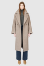 The ISABELLA Taupe Wool Coat is crafted from a luxurious Italian wool-cashmere blend, designed with a relaxed, oversized silhouette. Its double-breasted closure and drop-shoulder construction create an effortlessly modern drape, while kimono gusset sleeves add fluidity and ease of movement. A large notch collar and single welt pockets complete the look, making ISABELLA a timeless statement piece in contemporary outerwear.