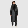 The Libra Jet Silky Shearling Coat combines luxurious nappa with Toscana rasado shearling for a contemporary parka-inspired design. Featuring an oversized shawl collar and raw-edge hem, this coat delivers a relaxed silhouette with subtle structure. Slight drop shoulders and a roomy fit through the arms and torso enhance ease of movement, while single welt side pockets and an interior zip pocket provide functional elegance. Finished with a four-button front closure