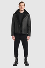 The Logan Black Shearling Moto Jacket delivers a modern interpretation of the classic moto silhouette, crafted from supple nappa leather with a plush shearling lining. Designed to fit true to size, this jacket balances streamlined tailoring with rugged edge. An asymmetrical zip closure and spread collar reinforce its moto-inspired attitude, while an interior zip pocket provides discreet functionality. Refined yet versatile, Logan is a timeless investment piece built for cold-weather wear.