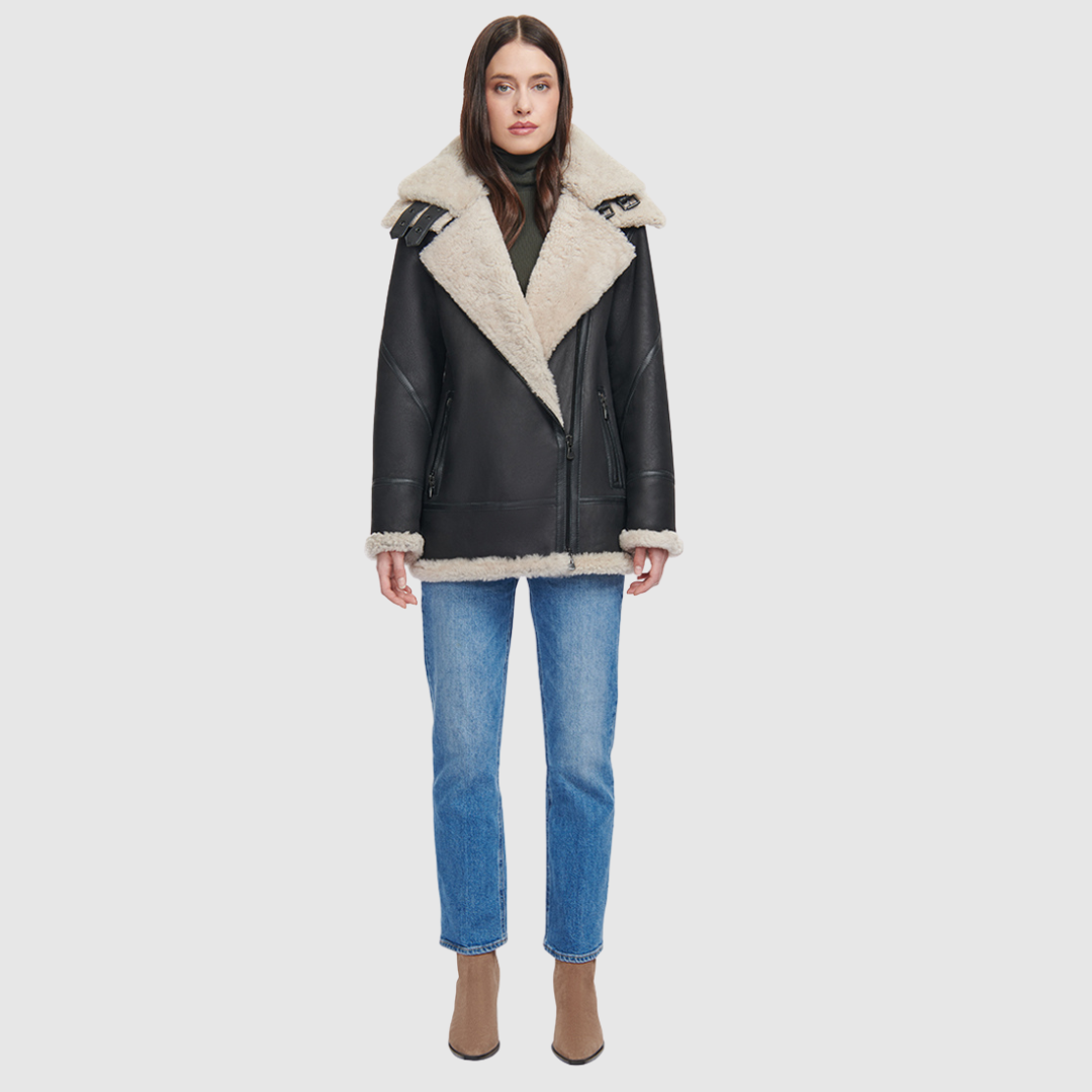 Relaxed medium length nappa moto shearling Drop shoulder Curly wool collar and trims Interior zip pocket