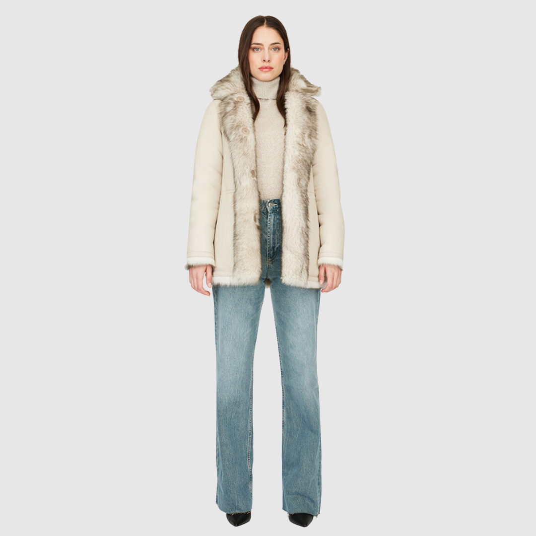 Transform your style with the HiSO Milky Way Shadow Reversible Shearling Teddy, featuring a versatile design that reverses between a luxurious toscana rasado teddy and a sleek nappa skin-out jacket. Enjoy a relaxed fit when wearing the wool-out side, or a regular fit when sporting the skin-out side. The spread collar adds a touch of sophistication, while the slash side pockets on the toscana teddy side and patch side pockets on the nappa side provide convenient storage. 