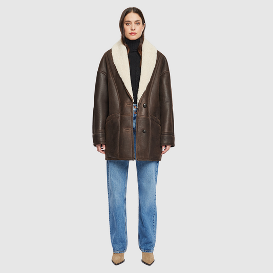 Oversized 80's inspired nappa jacket Drop shoulder Deep armholes and wide sleeves Curly wool shawl collar Interior zip pocket Patch side pockets Front button closure