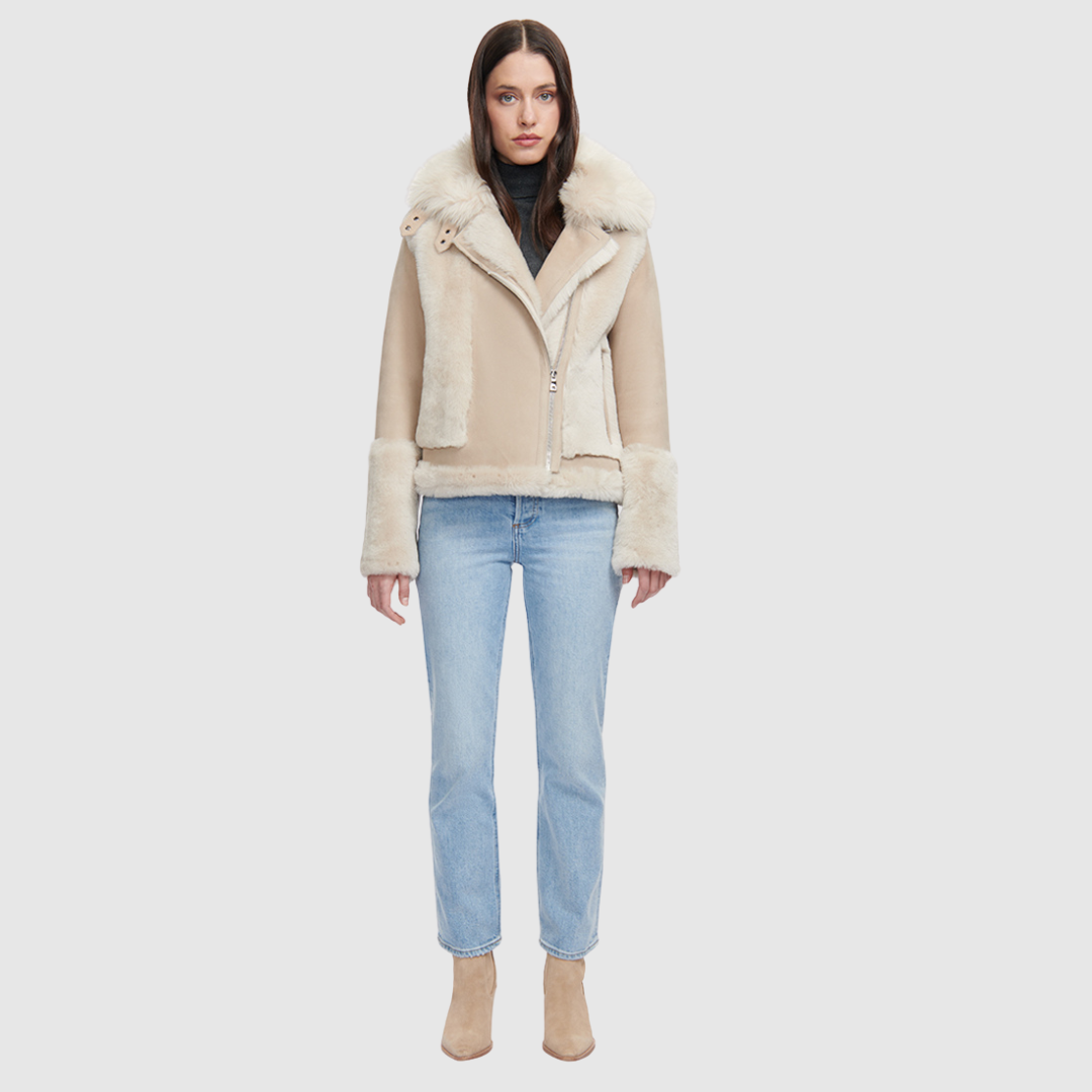 Soft wool on sleek suede moto Drop shoulder Wool out cuff detail & sheared wool body and sleeves Toscana long wool collar with double buckle detail Asymmetrical front zip closure Side and interior zip pockets