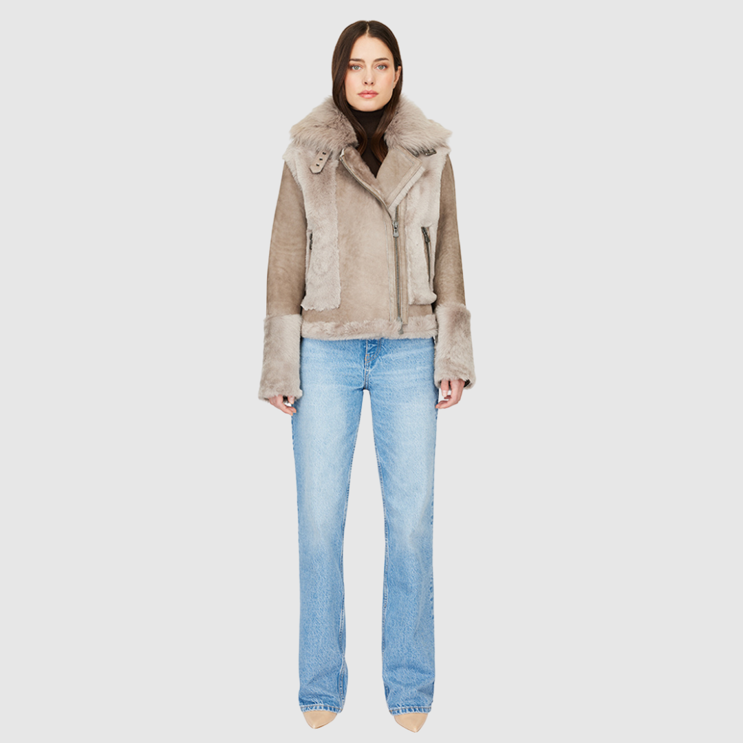 Soft wool on sleek suede moto Drop shoulder Wool out cuff detail & sheared wool body and sleeves Toscana long wool collar with double buckle detail Asymmetrical front zip closure Side and interior zip pockets