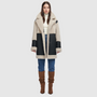 The HiSO Urban Black Beige Reversible Shearling offers a Nappa curly wool design with a mixed media coat for an oversized, loose-fitted style. With relaxed shoulders, deep armholes, and wide sleeves, this coat provides a comfortable and straight fit. It also features a snap closure for easy wear.
