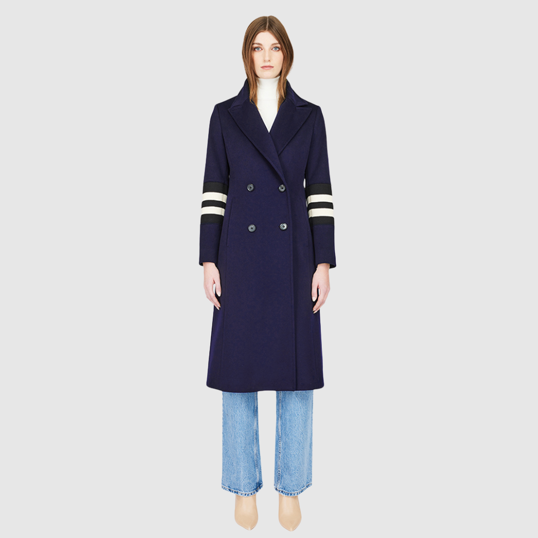 Italian wool cashmere blend Semi-fitted A-line silhouette Double breasted Regular shoulder Fitted through shoulders and arms, looser through torso Knit stripe detailing on arm Notch collar Slash pockets 