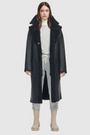 nappa curly wool shearling Vintage inspired reversible notch collar Reverses to curly wool teddy Relaxed dropped shoulder 3 button closure Tie belt at waist Zip pockets on suede side, reverses to patch pockets on teddy side