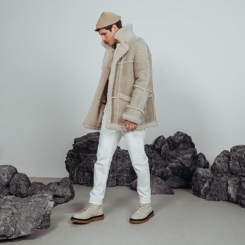 Cement Colour. Shearling. Fits true to size, Reversible. Comfortable fit in the shoulders and chest, straight cut through the torso when worn wool in. Looser fit in the shoulders, chest and torso when worn wool out. , Reversible, Notch lapel, Interior zipper pockets, 31 in