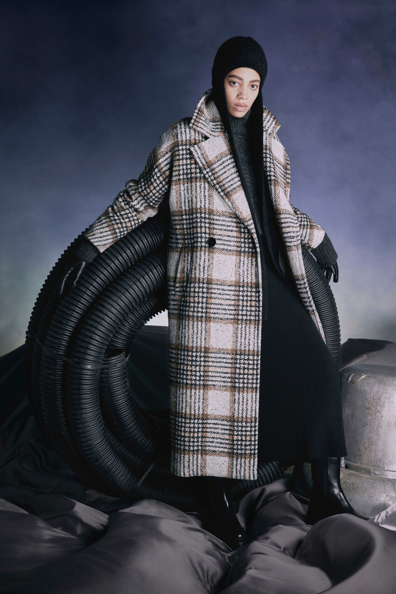 Introducing our ladies wool coat. This oversized Double-Breasted Italian Wool Cashmere Blend Coat is a winter wardrobe essential! Made in Canada, this coat combines warmth, style, and comfort. The notch collar, back vent, and front slash pockets add practicality, while the button closure ensures snugness. With its relaxed fit, itƒ??s perfect for chilly days. Elevate your outerwear game with this timeless piece! 