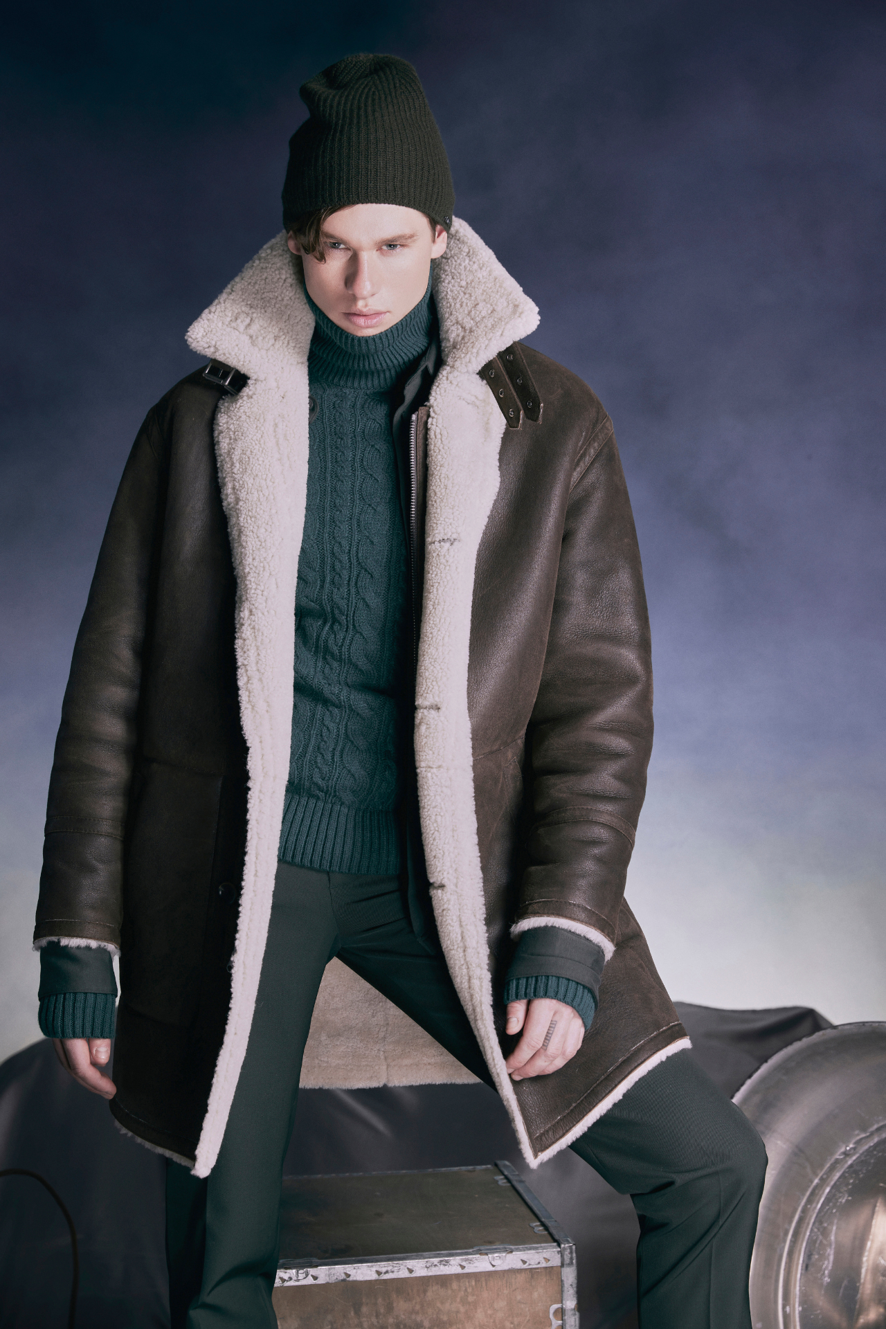 Explore winter in style with Chance, our designer mens shearling in arabica nappa coat. Reversible to a cozy curly wool teddy, it's warm and versatile. True to size, it fits comfortably with a loose fit through the torso and fits snugly across the shoulders. This 37" inch coat features a zip closure, 3-button closure, notch collar, and practical slash and patch pockets. 
