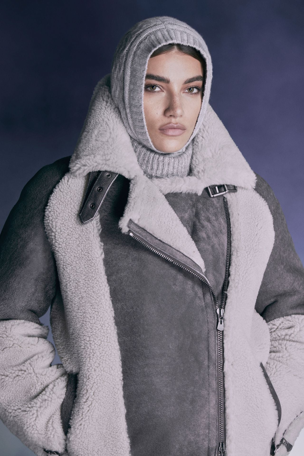 Curly wool on sleek suede aviator Drop shoulder Wool out cuff detail & sheared wool body and sleeves Curly wool collar with double buckle detail Asymmetrical front zip closure Side and interior zip pockets