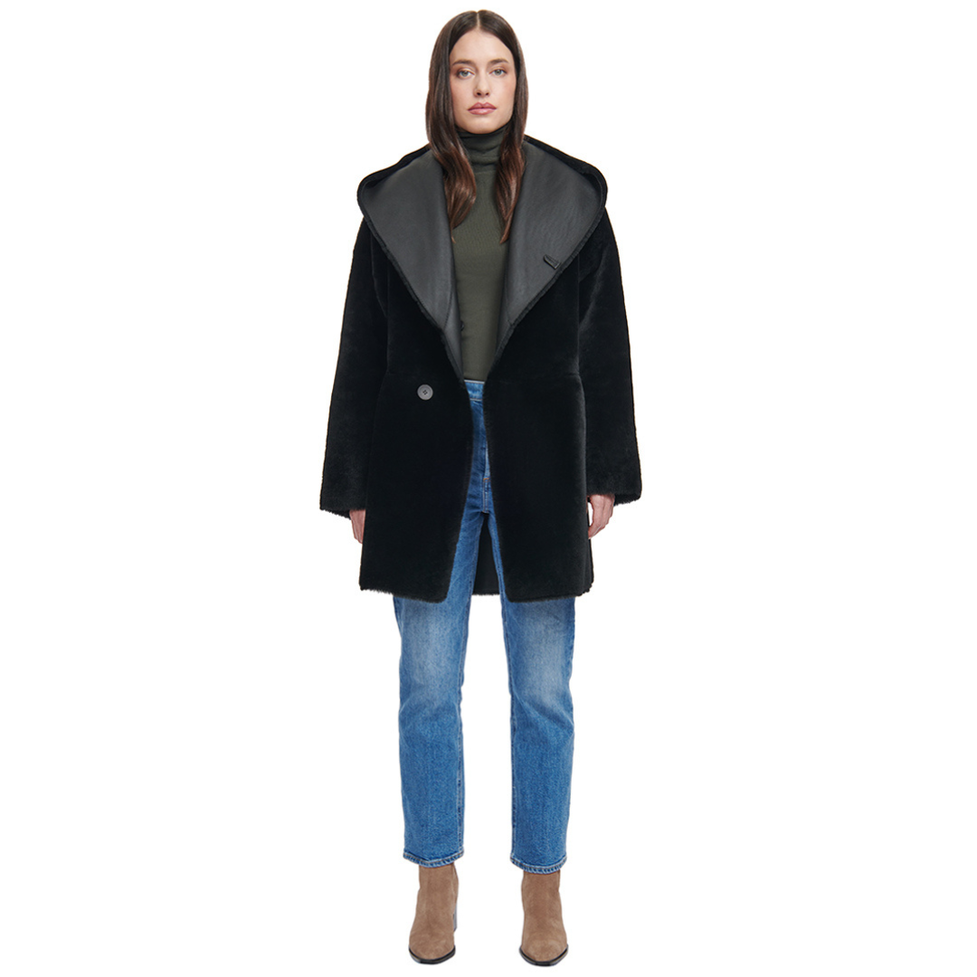 Reversible nappa oversized coat Reverses to ironed wool teddy Oversized hood, converts to shawl collar Raw edge finish Drop shoulder Button closure Pull through pocket